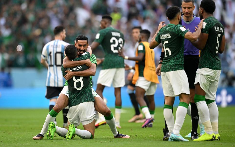 Saudi Arabia players celebrate the 2-1 win during the FIFA World Cup Qatar 2022 Group C match between Argentina and Saudi Arabia - GETTY IMAGES/Matthias Hangst