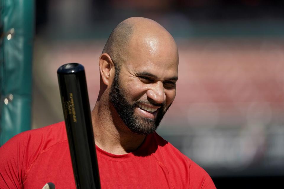 St. Louis Cardinals star Albert Pujols smiles during batting practice in October.