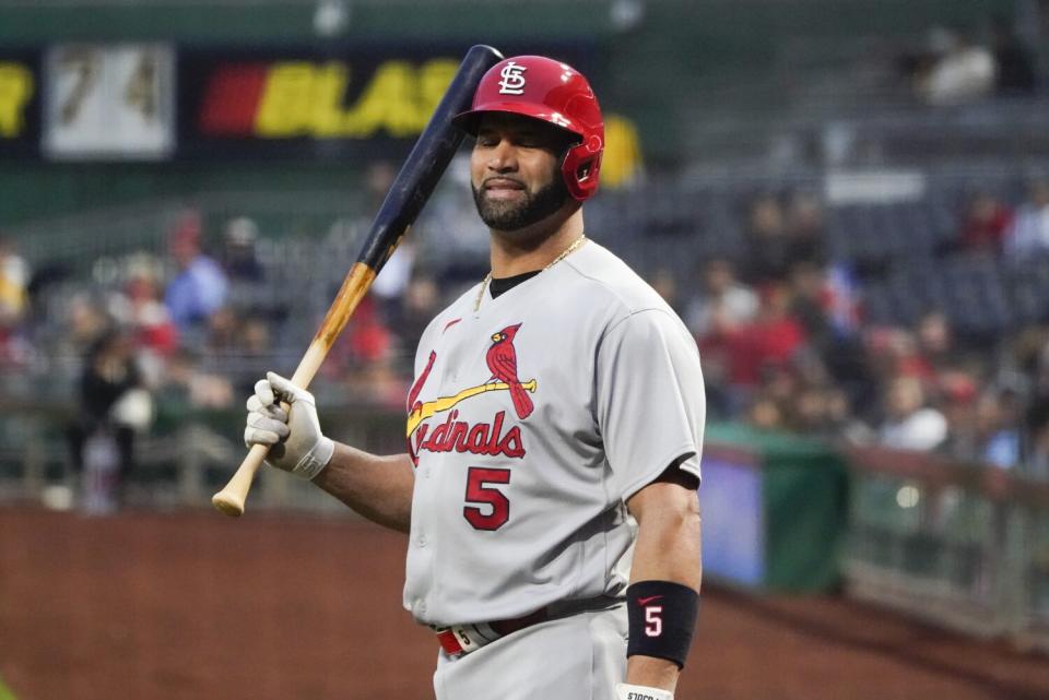 Albert Pujols warms up in the on deck circle before batting against the Pittsburgh Pirates on Oct. 4.