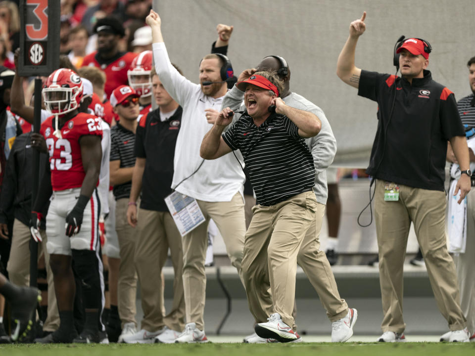 Georgia head coach Kirby Smart, center, reacts along the sideline during the first half of an NCAA college football game against Tennessee, Saturday, Nov. 5, 2022 in Athens, Ga. (AP Photo/John Bazemore)