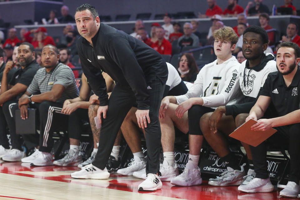 Dec 3, 2021; Houston, Texas, USA; Bryant University Bulldogs head coach Jared Grasso coaches against the Houston Cougars in the first half at Fertitta Center. Mandatory Credit: Thomas Shea-USA TODAY Sports