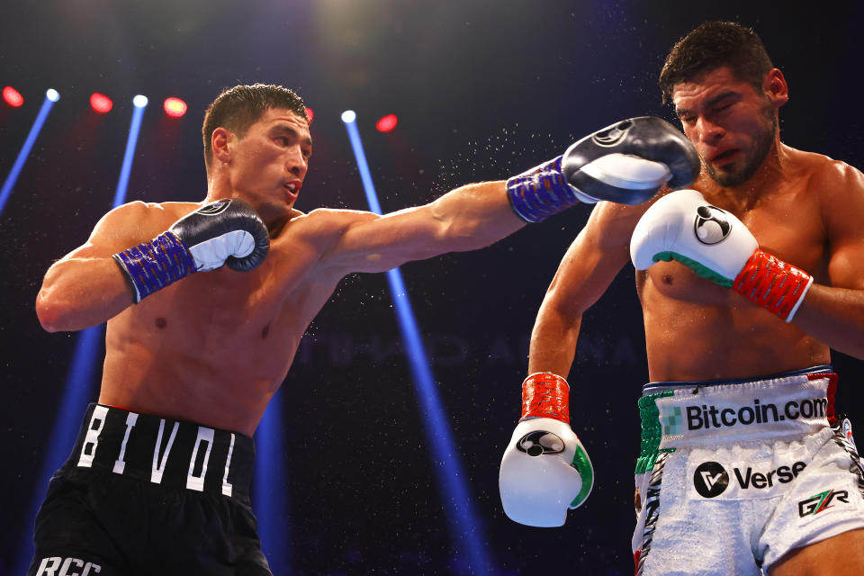 ABU DHABI, UNITED ARAB EMIRATES - NOVEMBER 05: Dmitrill Bivol punches Gilberto Ramirez during the WBA Super World Light Heavyweight Title fight between Dmitrii Bivol and Gilberto Ramirez at Etihad Arena on November 05, 2022 in Abu Dhabi, United Arab Emirates. (Photo by Francois Nel/Getty Images)