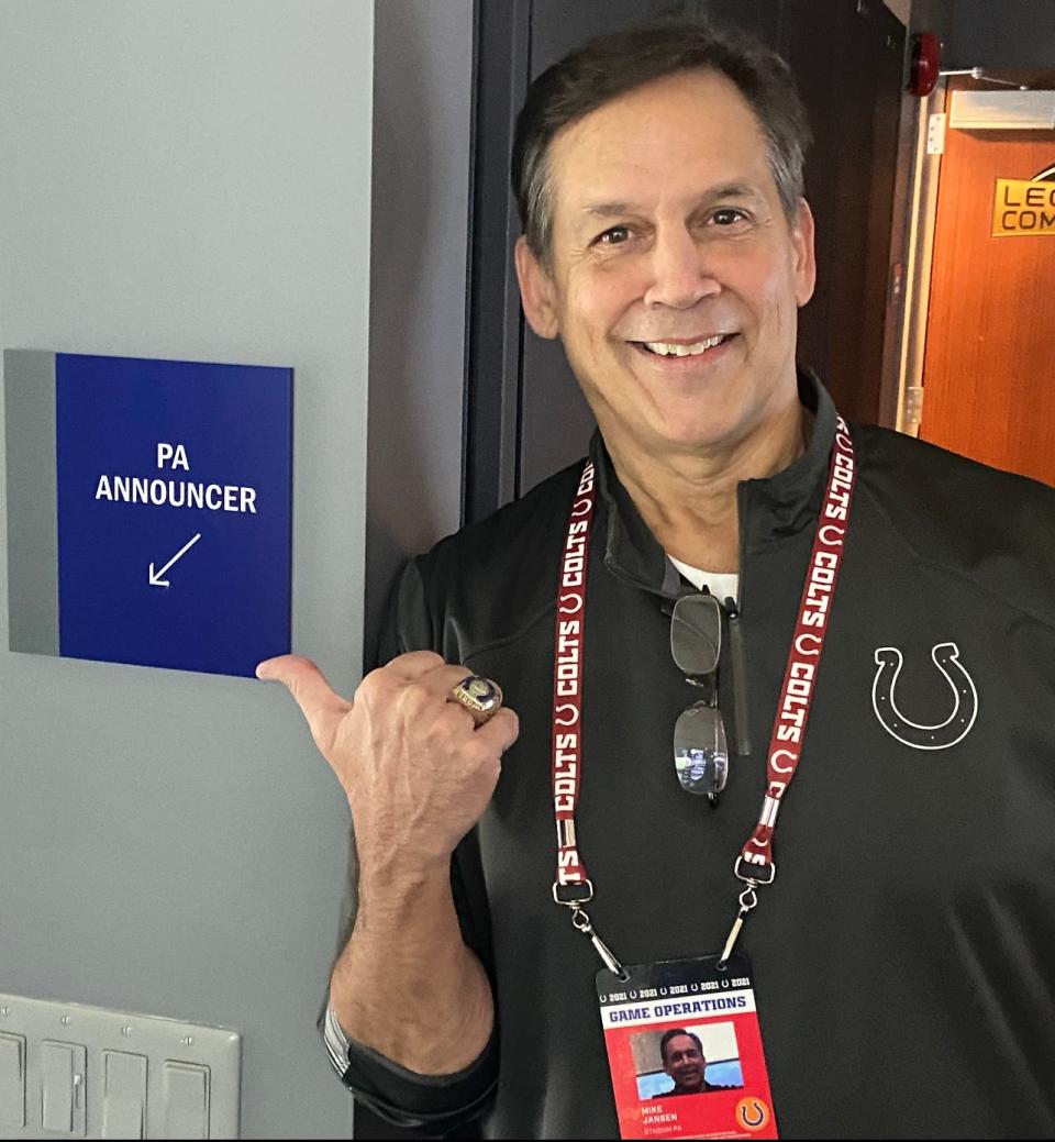 Mike Jansen stands next to his &quot;PA Announcer&quot; sign during his tenure as the stadium voice of the Indianapolis Colts.