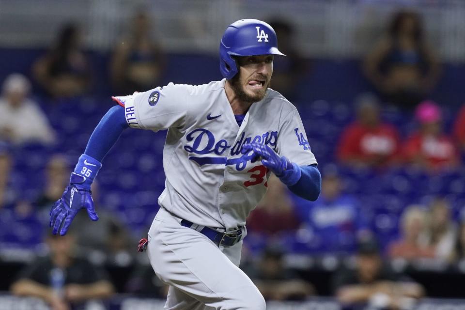 Los Angeles Dodgers' Cody Bellinger (35) runs to first base during a baseball game.