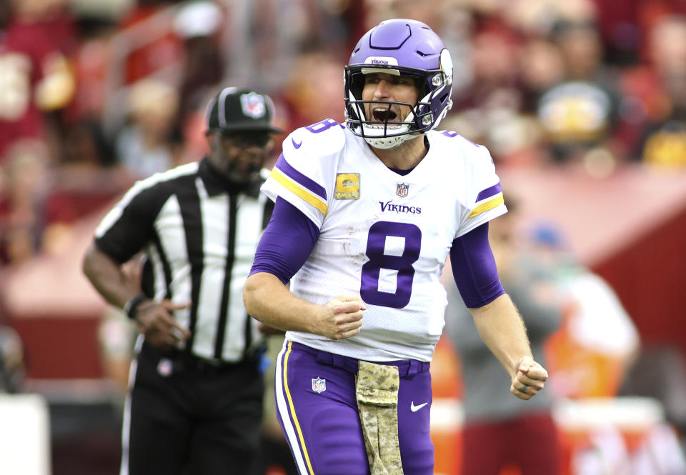 Minnesota Vikings quarterback Kirk Cousins (8) isn't putting up eye-popping numbers this season, but he's getting the job done when it matters. (AP Photo/Daniel Kucin Jr.)