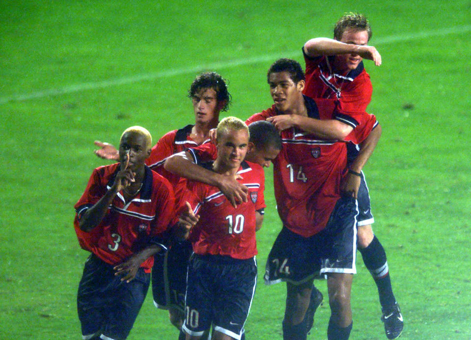 AUCKLAND, NEW ZEALAND - NOVEMBER 10: USA's players including DaMarcus Beasley (3) Landon Donovan (10) and Oguchi Onyewu celebrate the goal of Landon Donovan during their opening game against New Zealand in the FIFA U17 World Soccer Champs played at the Nth Harbour Stadium on Wednesday.USA won the match 21.DIGITAL IMAGE. (Photo by Phil Walter/Getty Images)
