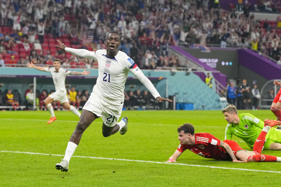 DOHA, QATAR - NOVEMBER 21: Timothy Weah of USA celebrates after scoring his team's first goal during the FIFA World Cup Qatar 2022 Group B match between USA and Wales at Ahmad Bin Ali Stadium on November 21, 2022 in Doha, Qatar. (Photo by Ulrik Pedersen/DeFodi Images via Getty Images)