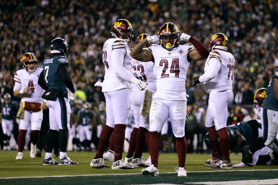 Washington Commanders running back Antonio Gibson celebrates his touchdown against the Philadelphia Eagles.