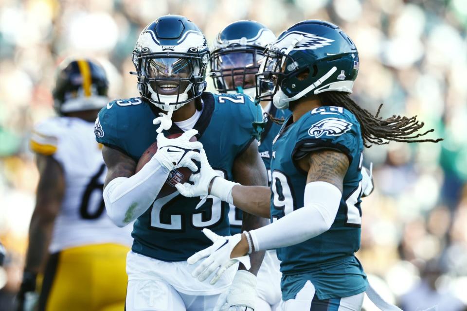 Philadelphia Eagles safety C.J. Gardner-Johnson celebrates his interception with cornerback Avonte Maddox.