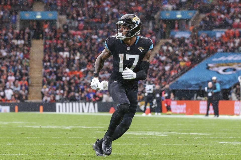 Jacksonville Jaguars tight end Evan Engram covers a punt during a game.