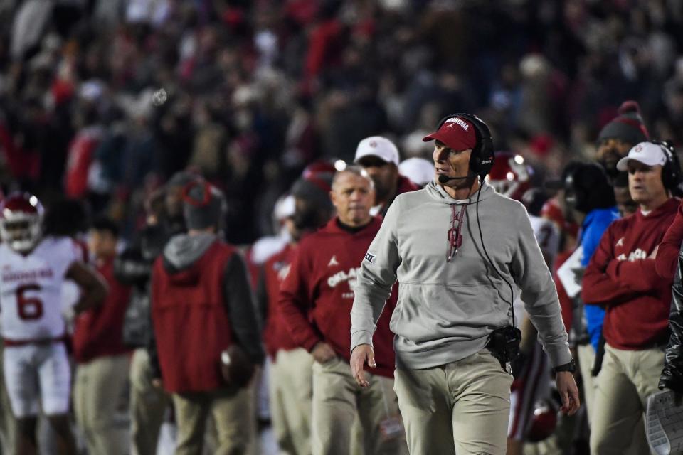 Oklahoma coach Brent Venables watches from the sideline during the first half of the team's NCAA college football game against Texas Tech on Saturday, Nov. 26, 2022, in Lubbock, Texas. (AP Photo/Justin Rex)