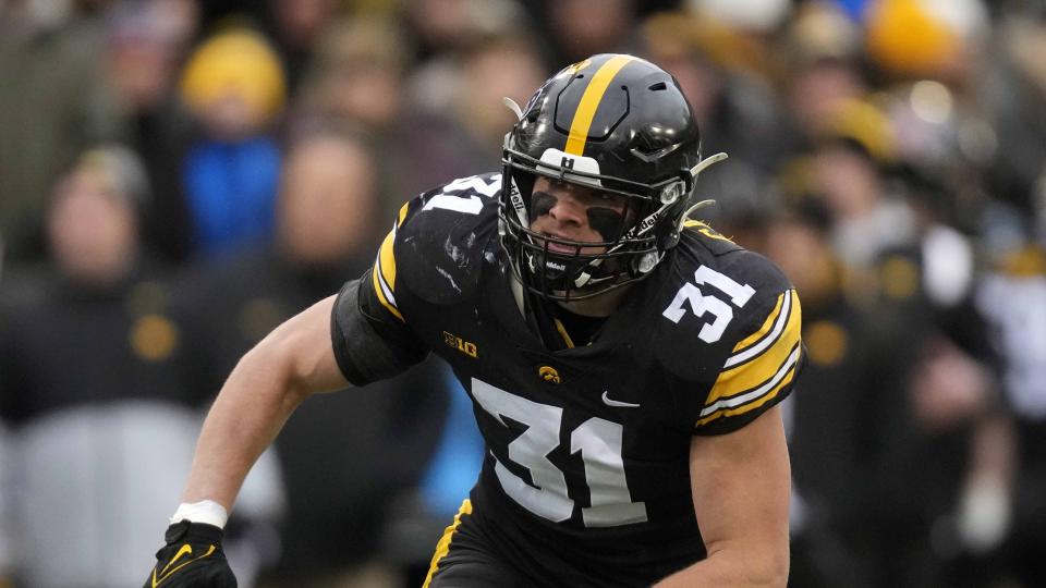 Iowa linebacker Jack Campbell looks to make a tackle during the first half of an NCAA college football game against Wisconsin, Saturday, Nov. 12, 2022, in Iowa City, Iowa. (AP Photo/Charlie Neibergall)