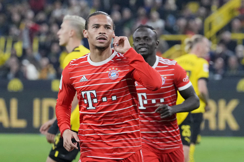 Bayern's Leroy Sane celebrates after scoring his side's second goal during the German Bundesliga soccer match between Borussia Dortmund and Bayern Munich in Dortmund, Germany, Saturday, Oct. 8, 2022. (AP Photo/Martin Meissner)