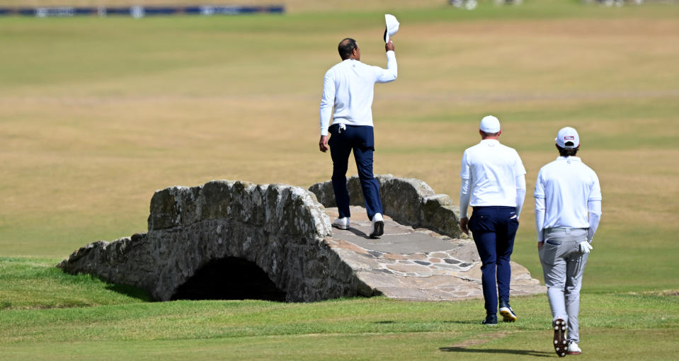 Tiger Woods acknowledges the gallery at the Open Championship in July. (Ross Kinnaird/Getty Images)