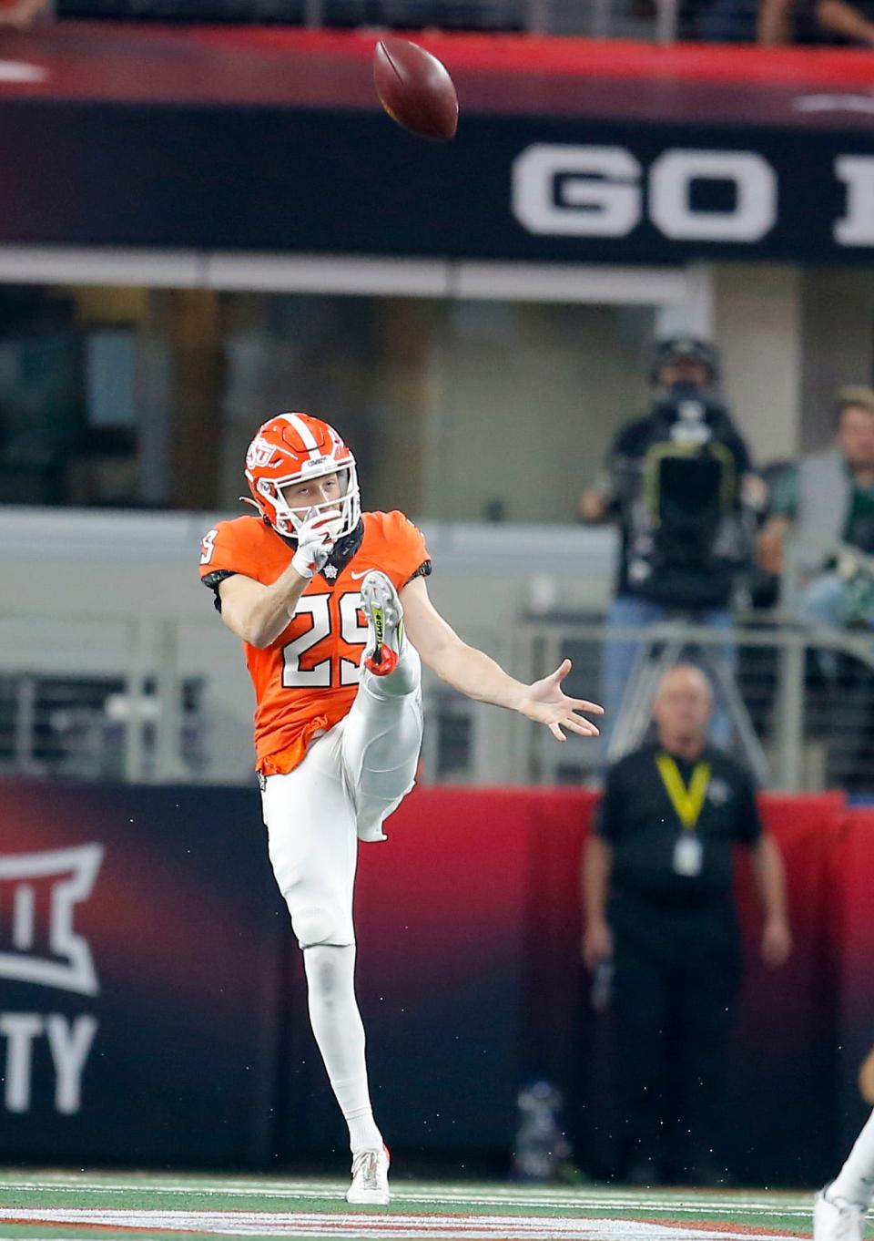 Oklahoma State punter Tom Hutton, seen here in the 2021 Big 12 title game vs. Baylor, is calling it a career in Stillwater.