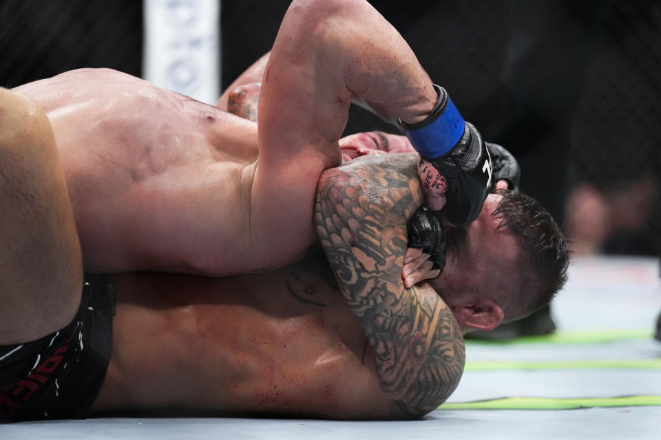 NEW YORK, NEW YORK - NOVEMBER 12: (R-L) Dustin Poirier secures a rear choke submission against Michael Chandler in a lightweight bout during the UFC 281 event at Madison Square Garden on November 12, 2022 in New York City. (Photo by Chris Unger/Zuffa LLC)