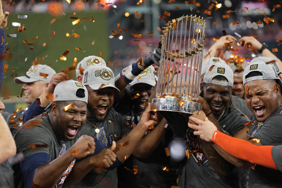 The Houston Astros celebrate their 4-1 World Series win against the Philadelphia Phillies in Game 6 on Saturday, Nov. 5, 2022, in Houston. (AP Photo/David J. Phillip)