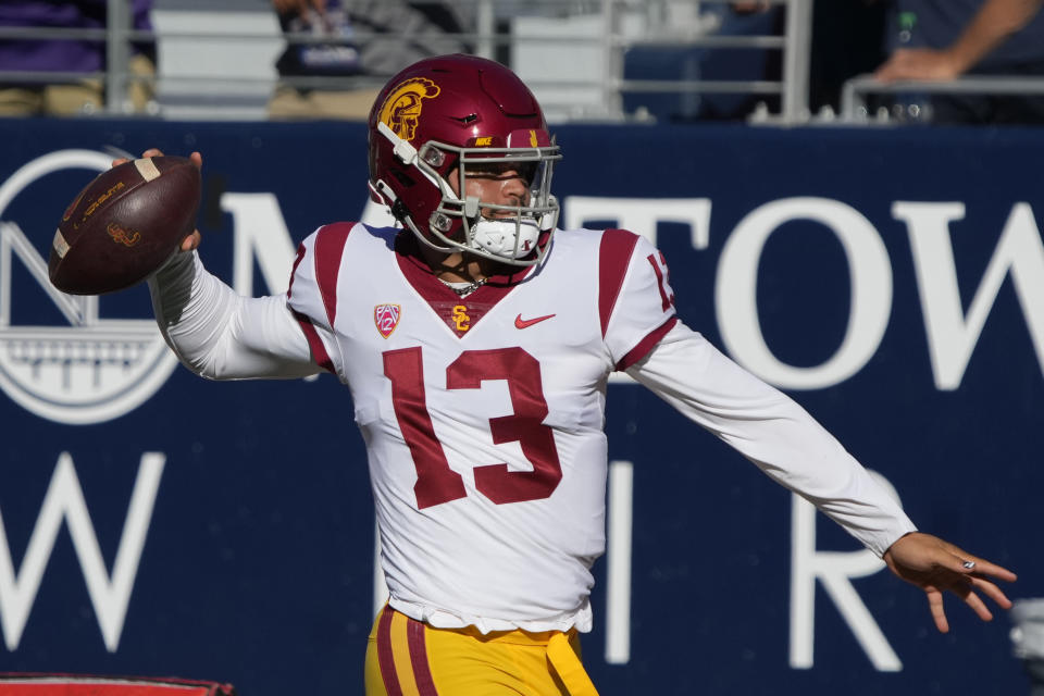 Southern California quarterback Caleb Williams (13) warms up before an NCAA college football game against Arizona, Saturday, Oct. 29, 2022, in Tucson, Ariz. (AP Photo/Rick Scuteri)