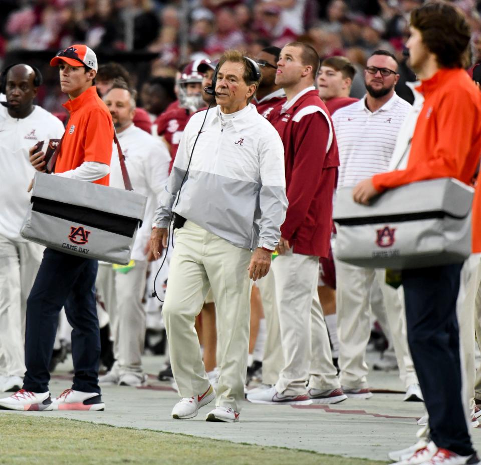 Nov 26, 2022; Tuscaloosa, Alabama, USA; Alabama head coach Nick Saban shows a cut on his face after being hit by a player during a celebration at Bryant-Denny Stadium. Mandatory Credit: Gary Cosby Jr.-USA TODAY Sports