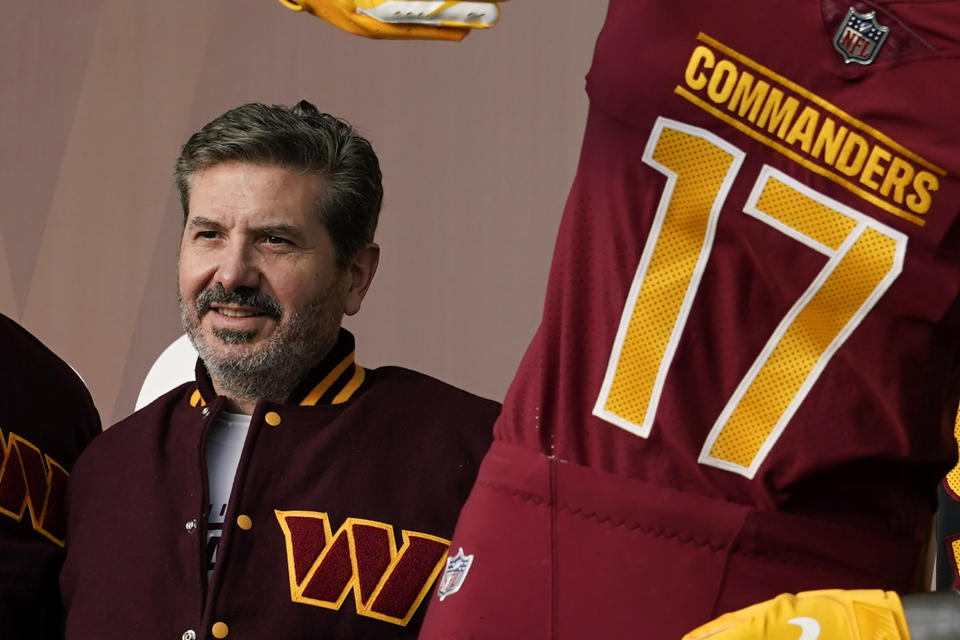 FILE - Dan Snyder, co-owner and co-CEO of the Washington Commanders, poses for photos during an event to unveil the NFL football team's new identity, Wednesday, Feb. 2, 2022, in Landover, Md. A woman accused Washington Commanders owner Dan Snyder of sexually harassing and assaulting her on a team plane in 2009, and the woman was later paid $1.6 million by the team to settle her claims, according to a document obtained by the Washington Post, Tuesday, June 21, 2022. (AP Photo/Patrick Semansky, File)