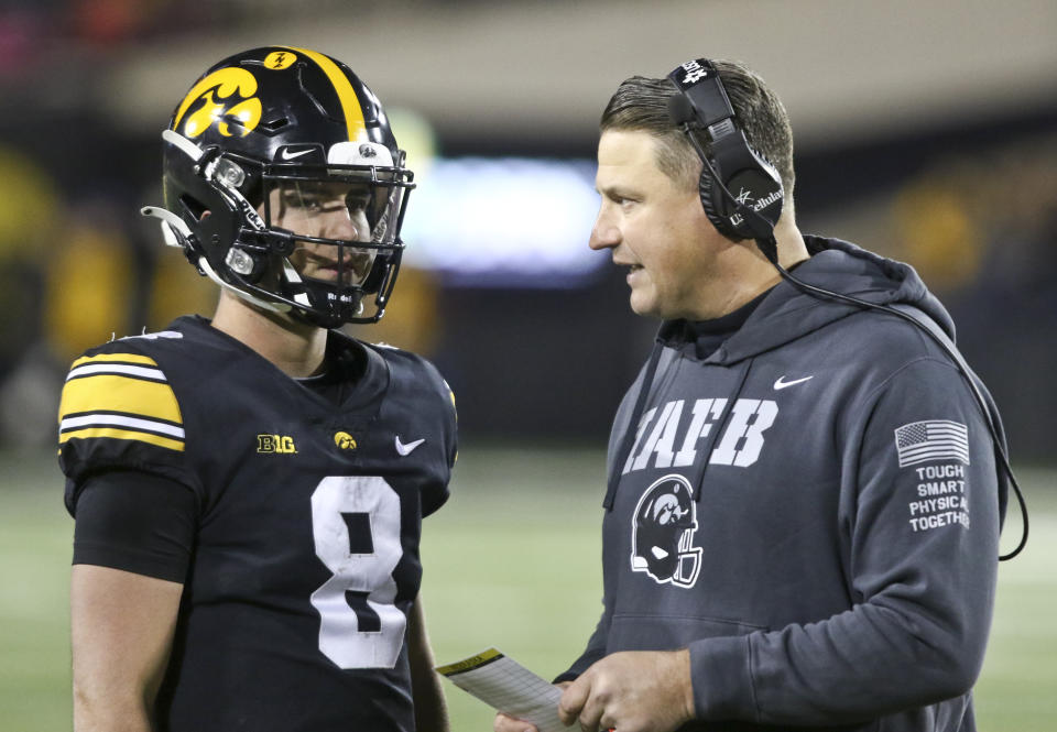 Iowa offensive coordinator Brian Ferentz (right) talks with quarterback Alex Padilla during a game against Nebraska on November 25, 2022 in Iowa City, Iowa. (Photo by Matthew Holst/Getty Images)