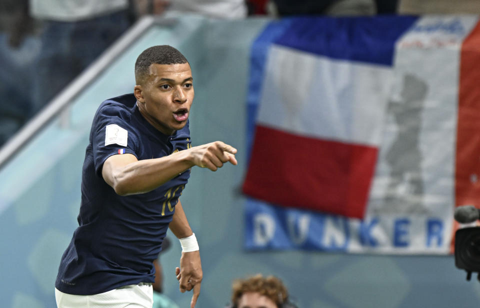 AL WAKRAH, QATAR - NOVEMBER 22: Kylian Mbappe of France celebrates after scoring a goal during the FIFA World Cup 2022 Group D match between France and Australia at Al Janoub Stadium in Al Wakrah, Qatar on November 22, 2022. (Photo by ErÃ§in ErtÃ¼rk/Anadolu Agency via Getty Images)