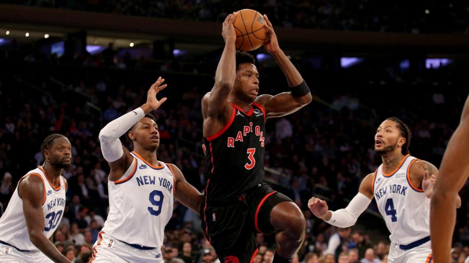 Nov 1, 2021; New York, New York, USA; Toronto Raptors forward OG Anunoby (3) looks to pass against New York Knicks forward Julius Randle (30) and guards RJ Barrett (9) and Derrick Rose (4) during the first quarter at Madison Square Garden. Mandatory Credit: Brad Penner-USA TODAY Sports