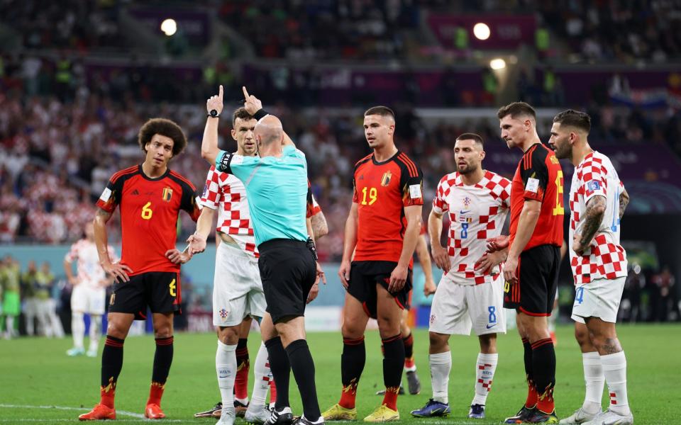 Referee Anthony Taylor checks the VAR screen - Michael Steele/GETTY IMAGES