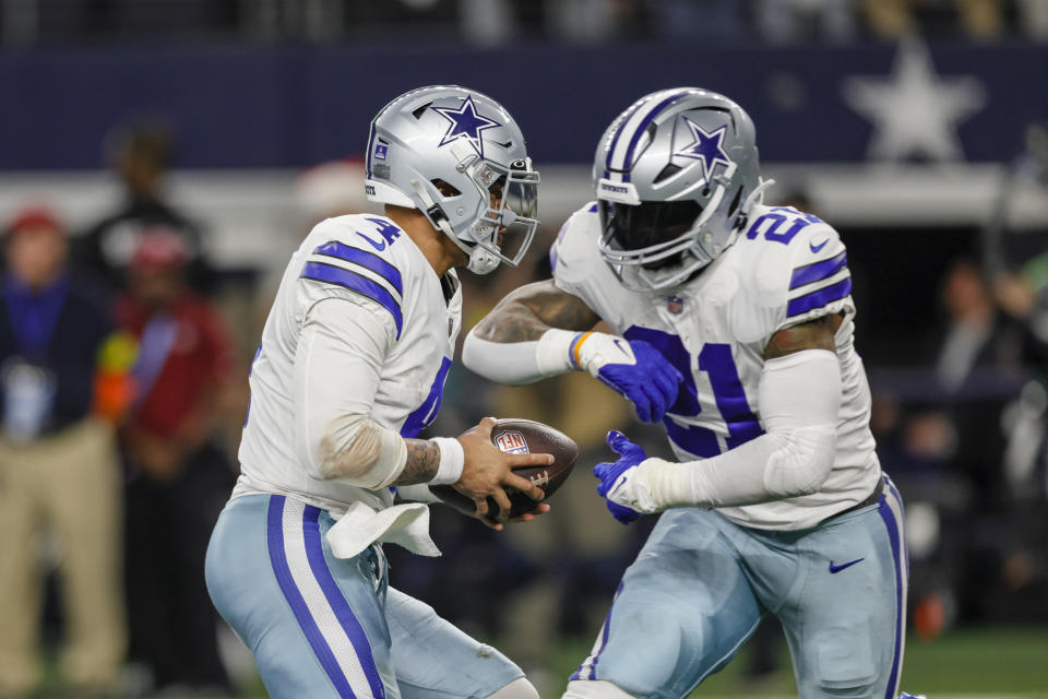 Dallas Cowboys quarterback Dak Prescott (4) and running back Ezekiel Elliott (21) are a strong fantasy combo