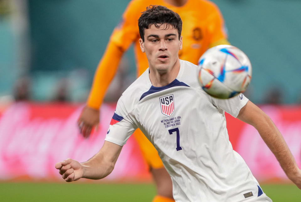 AL RAYYAN, QATAR - DECEMBER 3: Gio Reyna #7 of the United States chases after a loose ball during a FIFA World Cup Qatar 2022 Round of 16 match between Netherlands and USMNT at Khalifa International Stadium on December 3, 2022 in Al Rayyan, Qatar. (Photo by John Todd/ISI Photos/Getty Images)