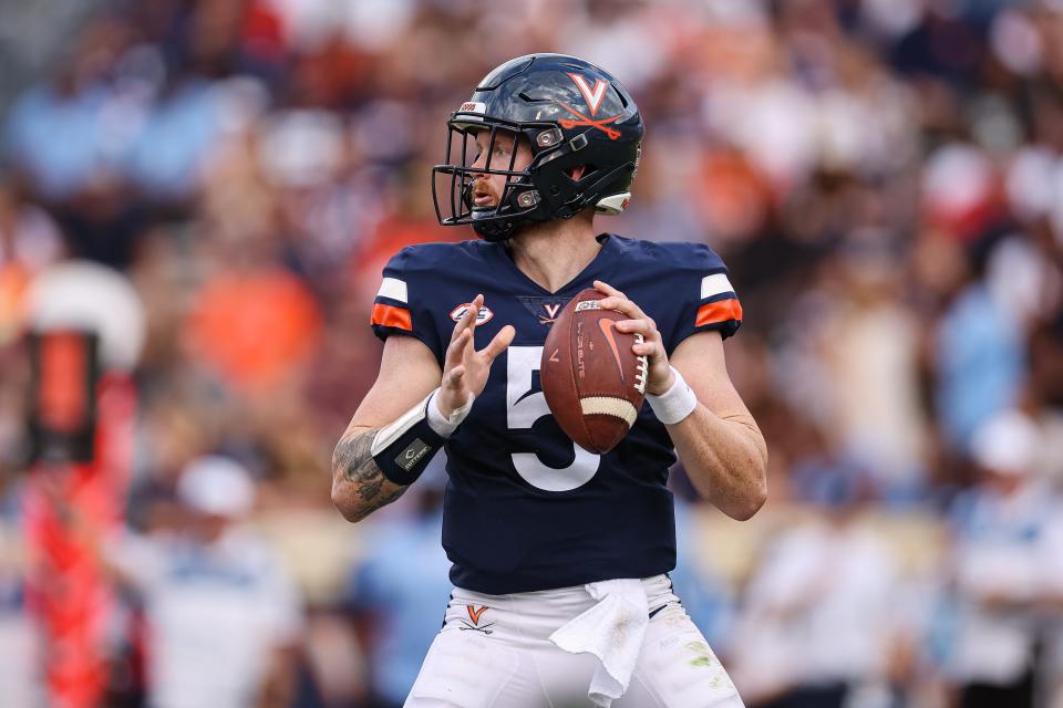 Virginia quarterback Brennan Armstrong attempts a pass against North Carolina on Nov. 5, 2022.