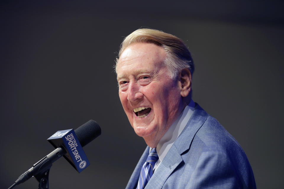 FILE - In this Sept. 24, 2016 file photo, Los Angeles Dodgers broadcaster Vin Scully answers questions during a news conference at Dodger Stadium in Los Angeles. Scully took a fall in his home Tuesday, April 21, 2020, and was taken to the hospital, where he was 