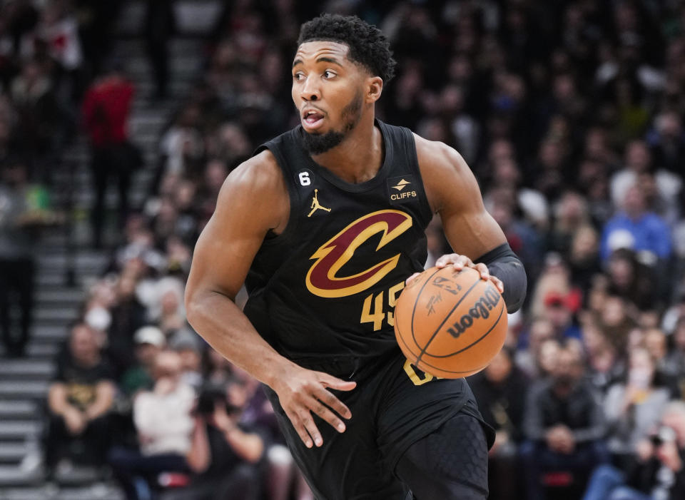 Cleveland Cavaliers guard Donovan Mitchell dribbles against the Toronto Raptors on Nov. 28, 2022, in Toronto. (Mark Blinch/Getty Images)