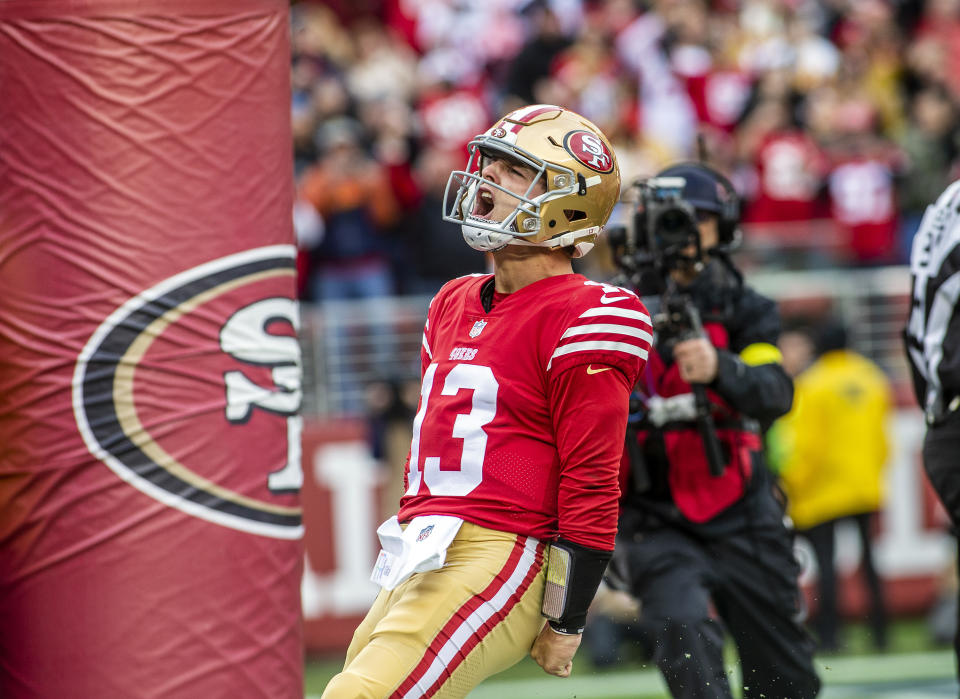 San Francisco 49ers quarterback Brock Purdy (13) celebrates a touchdown against the Tampa Bay Buccaneers on December 11, 2022, at Levis Stadium, in Santa Clara, Calif. (Photo by Tony Ding/Icon Sportswire via Getty Images)