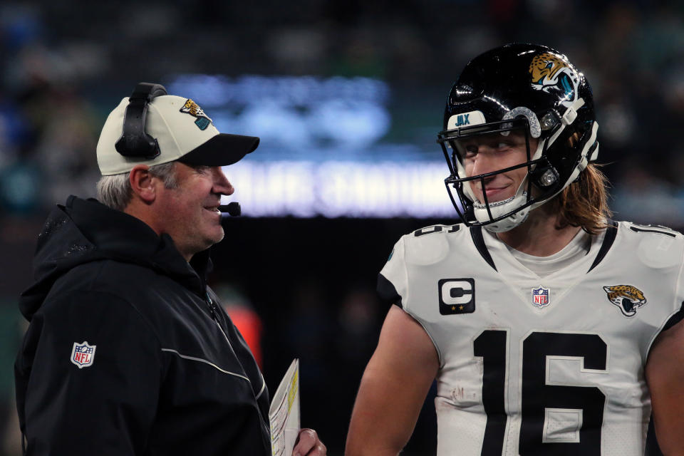 EAST RUTHERFORD, NEW JERSEY - DECEMBER 22: Head Coach Doug Pederson discusses a play with Quarterback Trevor Lawrence #16 of the Jacksonville Jaguars in the Thursday Night Football game in the rain between the Jacksonville Jaguars vs the New York Jets at MetLife Stadium on December 22, 2022 in East Rutherford, New Jersey. (Photo by Al Pereira/Getty Images)