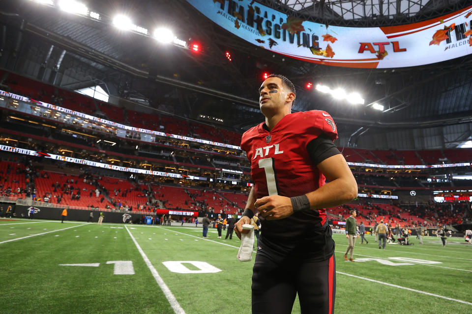 ATLANTA, GEORGIA - NOVEMBER 20: Marcus Mariota #1 of the Atlanta Falcons jogs off the field after Atlanta's 27-24 win against the Chicago Bears at Mercedes-Benz Stadium on November 20, 2022 in Atlanta, Georgia. (Photo by Kevin C. Cox/Getty Images)