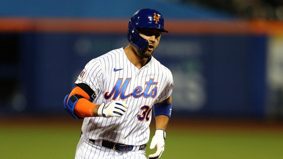 New York Mets right fielder Michael Conforto (30) rounds the bases after hitting a solo home run against the Los Angeles Dodgers during the fourth inning at Citi Field.