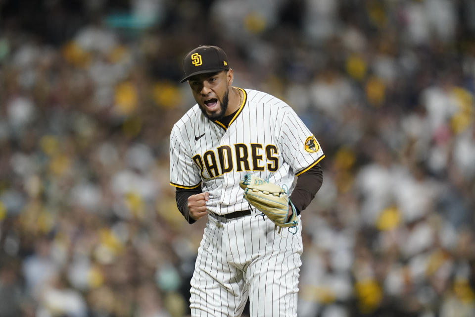 Robert Suarez earned trust and a key role in the Padres' playoff bullpen. He could hit free agency with a burnished reputation. (AP Photo/Ashley Landis)