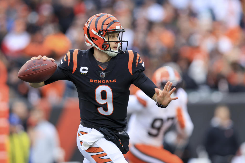 Cincinnati Bengals quarterback Joe Burrow is still in a battle for the AFC North title with the Ravens. (AP Photo/Aaron Doster)