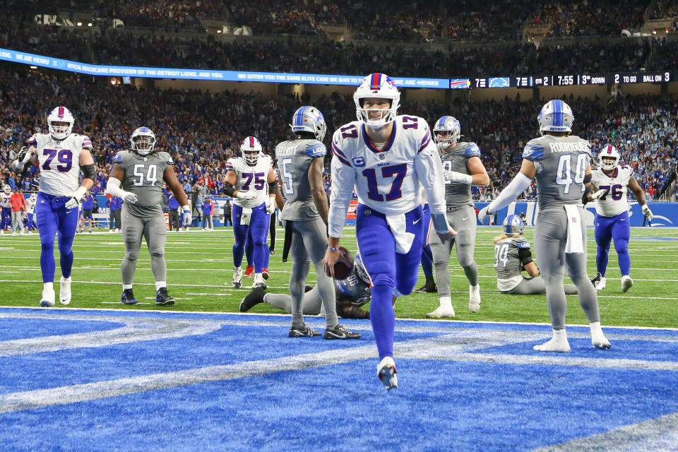 DETROIT, MI - NOVEMBER 24: Buffalo Bills quarterback Josh Allen (17) runs with the ball into the end zone for a touchdown during a regular season NFL football game between the Buffalo Bills and the Detroit Lions on Thanksgiving Day on November 24, 2022 at Ford Field in Detroit, Michigan. (Photo by Scott W. Grau/Icon Sportswire via Getty Images)