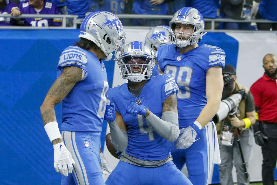 Detroit Lions' DJ Chark celebrates his touchdown reception during the first half of an NFL football game against the Minnesota Vikings Sunday, Dec. 11, 2022, in Detroit. (AP Photo/Duane Burleson)
