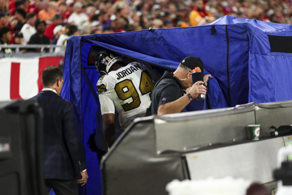 TAMPA, FL - DECEMBER 5: Cameron Jordan #94 of the New Orleans Saints walks into the injury tent on the sidelines during the fourth quarter of an NFL football game against the Tampa Bay Buccaneers at Raymond James Stadium on December 5, 2022 in Tampa, Florida. (Photo by Kevin Sabitus/Getty Images)