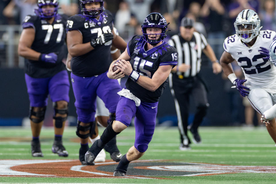 ARLINGTON, TX - DECEMBER 03: TCU Horned Frogs quarterback Max Duggan (#15) runs up field during the Big 12 Championship game between the Kansas State Wildcats and TCU Horned Frogs on December 03, 2022 at AT&T Stadium in Arlington, TX. (Photo by Matthew Visinsky/Icon Sportswire via Getty Images)