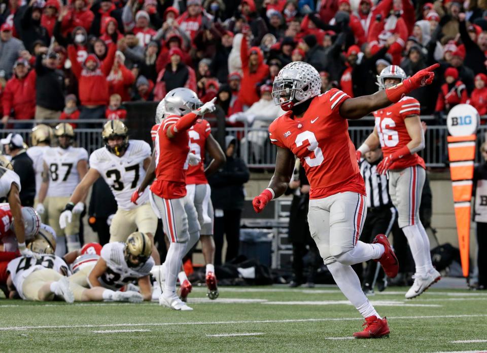 Ohio State Buckeyes linebacker Teradja Mitchell (3) celebrates after Ohio State Buckeyes defensive tackle Jerron Cage (86) recovered a fumble during Saturday's NCAA Division I football game against the Purdue University Boilerbmakers at Ohio Stadium in Columbus, Oh., on November 13, 2021.