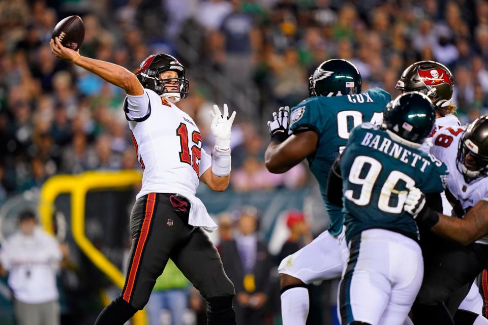 Tampa Bay Buccaneers quarterback Tom Brady (12) passes during the second half of an NFL football game against the Philadelphia Eagles on Thursday, Oct. 14, 2021, in Philadelphia.