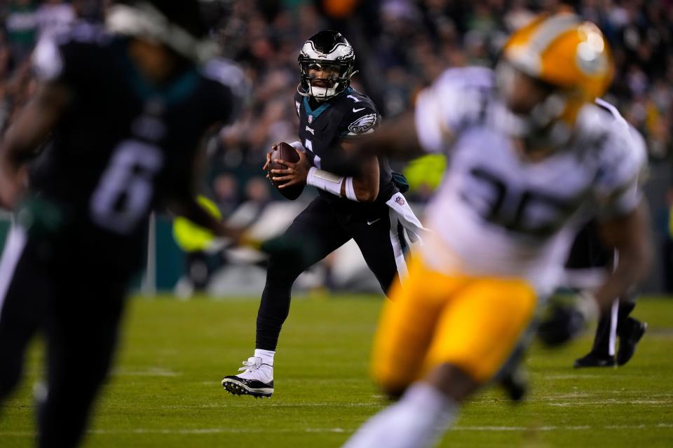 Philadelphia Eagles quarterback Jalen Hurts (1) looks to throw during the first half of an NFL football game against the Green Bay Packers, Sunday, Nov. 27, 2022, in Philadelphia.