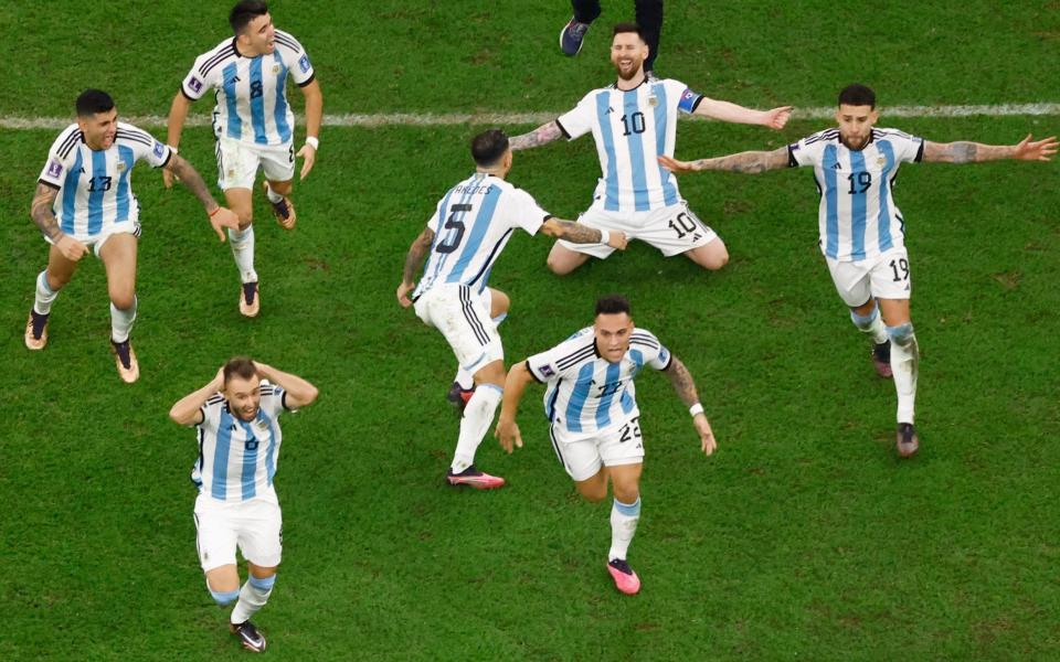 Argentina players celebrate/The 11 reasons this was the greatest World Cup final - REUTERS/PETER CZIBORRA