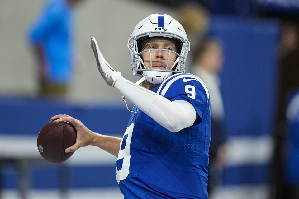 Indianapolis Colts quarterback Nick Foles (9) throws before an NFL football game against the Washington Commanders in Indianapolis, Sunday, Oct. 30, 2022. (AP Photo/Darron Cummings)