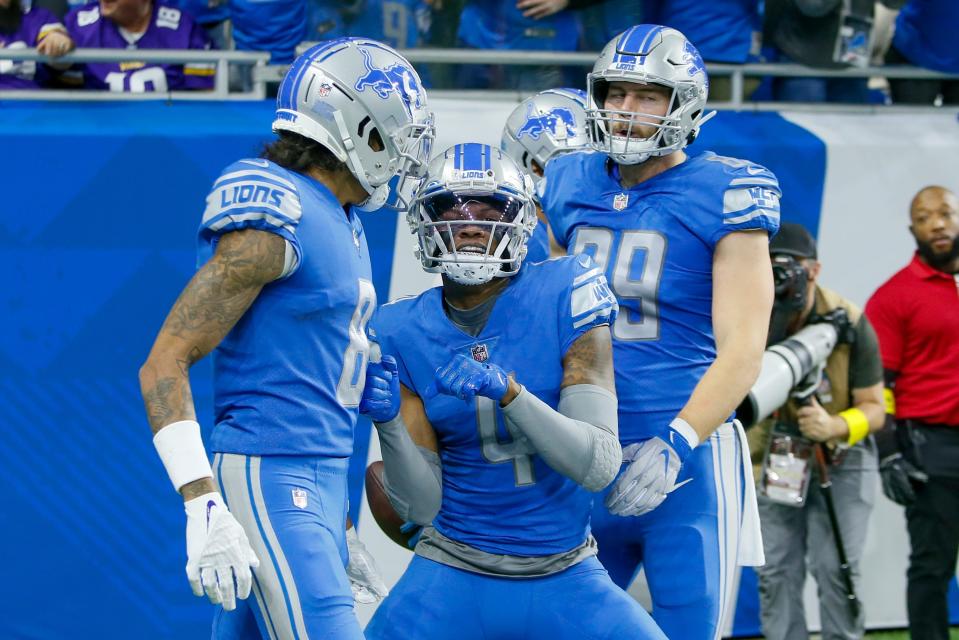 Detroit Lions' DJ Chark celebrates his touchdown reception during the first half of an NFL football game against the Minnesota Vikings Sunday, Dec. 11, 2022, in Detroit. (AP Photo/Duane Burleson)