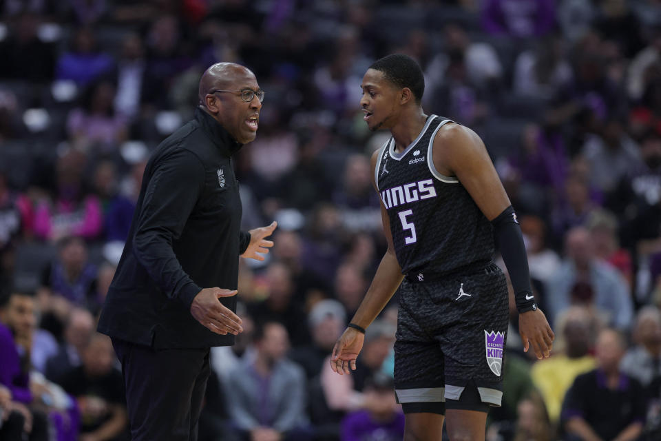 Sacramento Kings head coach Mike Brown gives instructions to guard De'Aaron Fox during a game this season at Golden 1 Center in Sacramento. (Sergio Estrada/USA TODAY Sports)